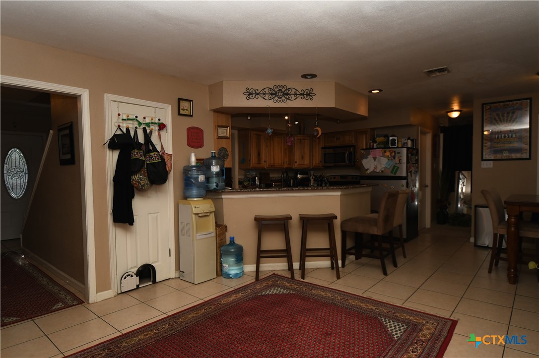 6019 Forest Ridge San Antonio, TX 78240 - Photo 3 of 25 a view of a room with gym equipment