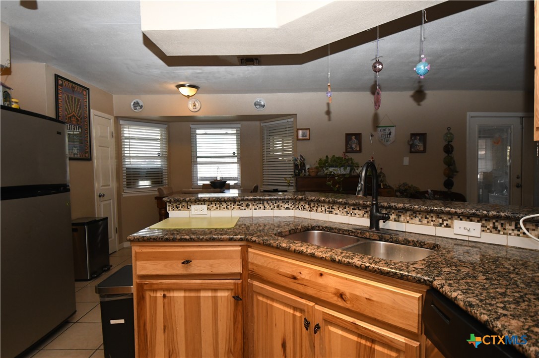 6019 Forest Ridge San Antonio, TX 78240 - Photo 6 of 25 a bathroom with a sink and a mirror