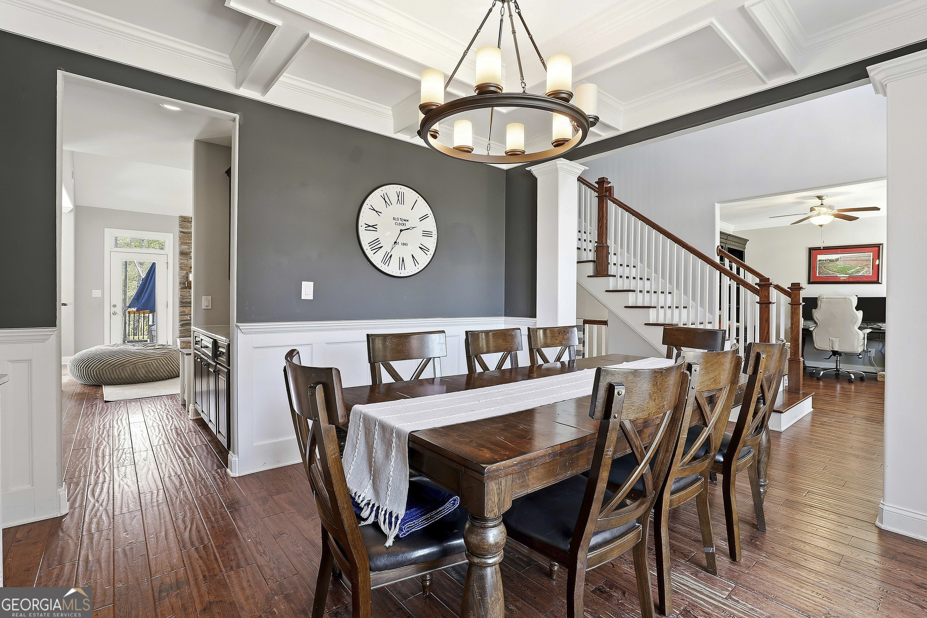 170 Emerson Ridge Trail Senoia, GA 30276 - Photo 11 of 24 a view of a dining room with furniture and a chandelier