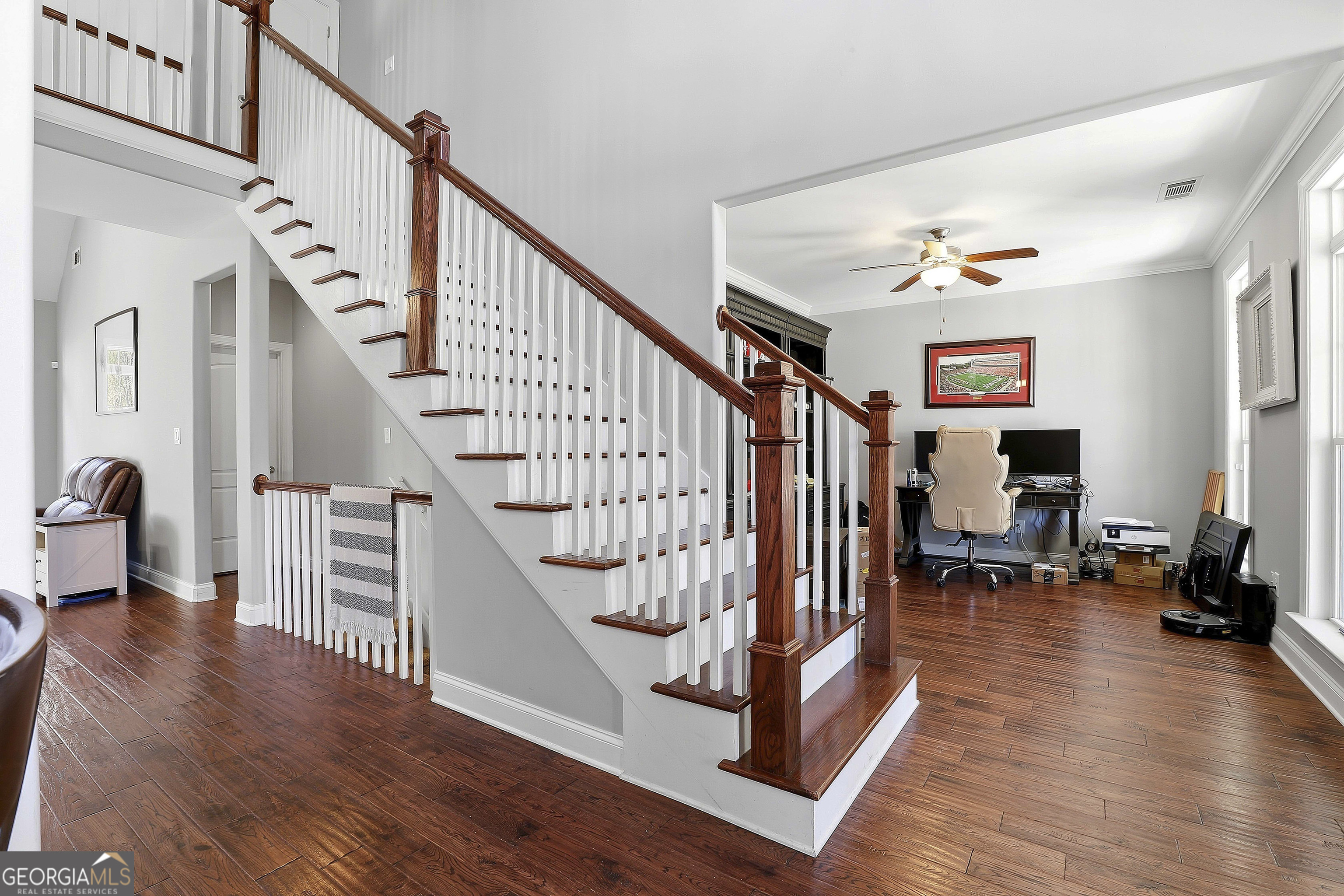 170 Emerson Ridge Trail Senoia, GA 30276 - Photo 12 of 24 a view of entryway livingroom and hall with wooden floor