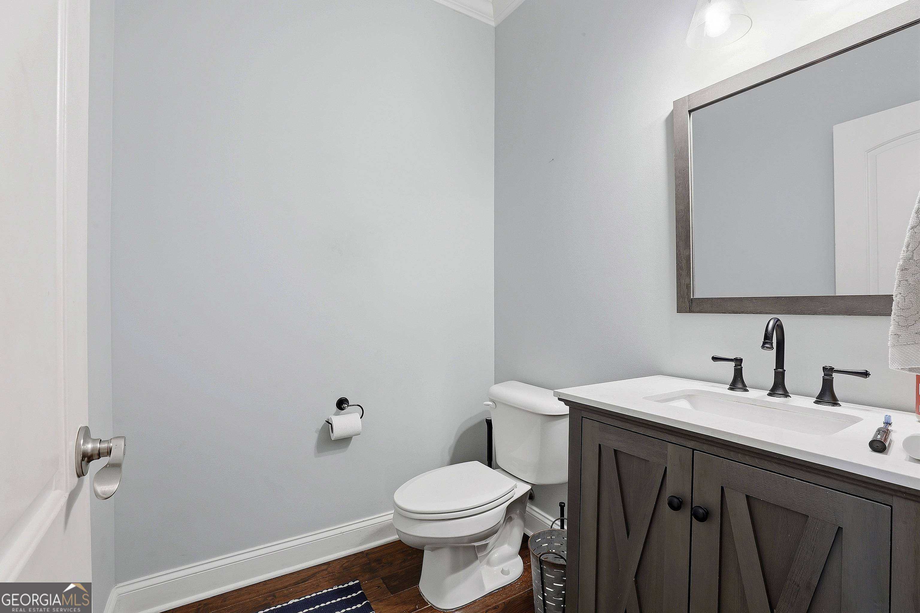 170 Emerson Ridge Trail Senoia, GA 30276 - Photo 14 of 24 a bathroom with a sink toilet and a mirror