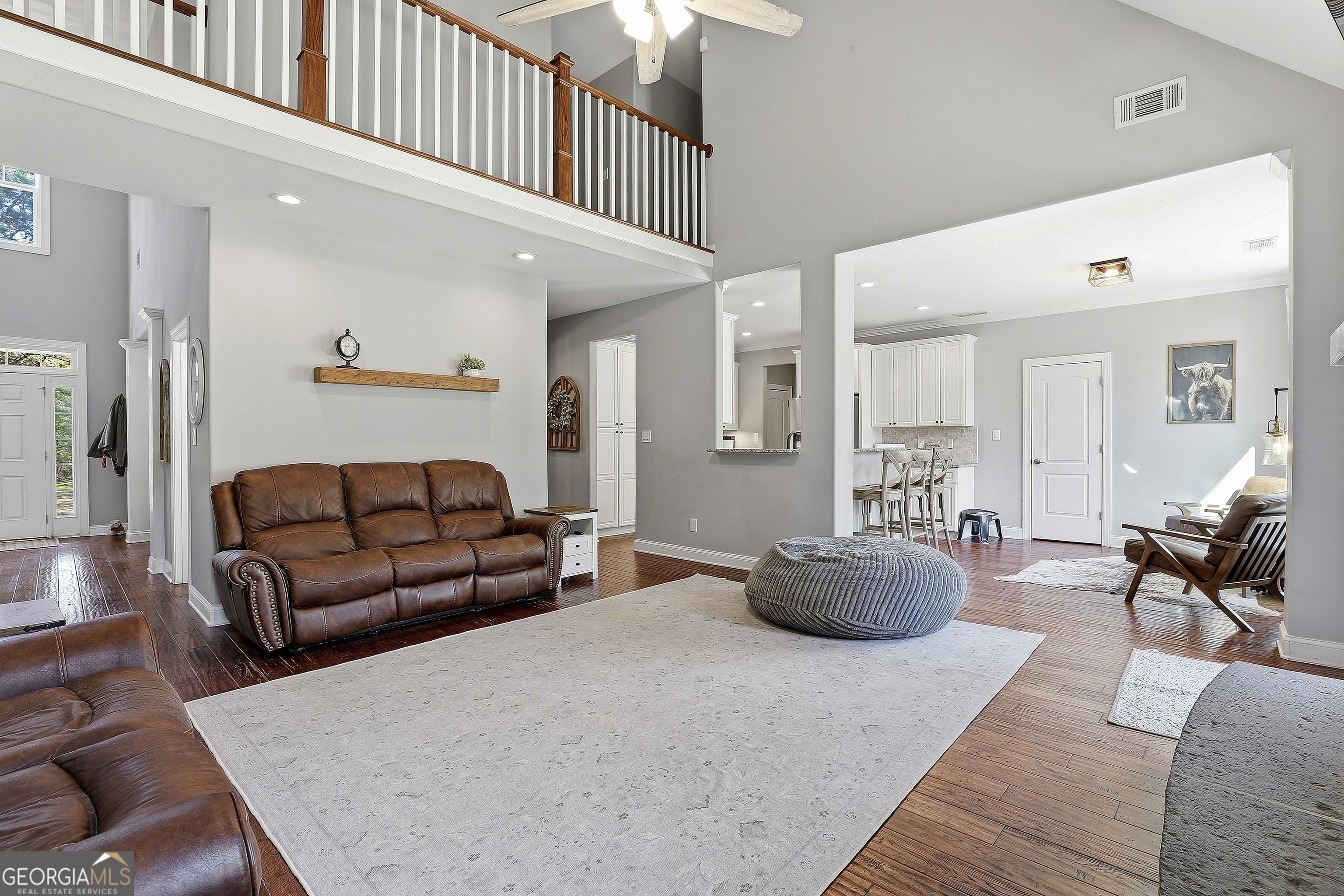 170 Emerson Ridge Trail Senoia, GA 30276 - Photo 20 of 24 a living room with furniture and a couch