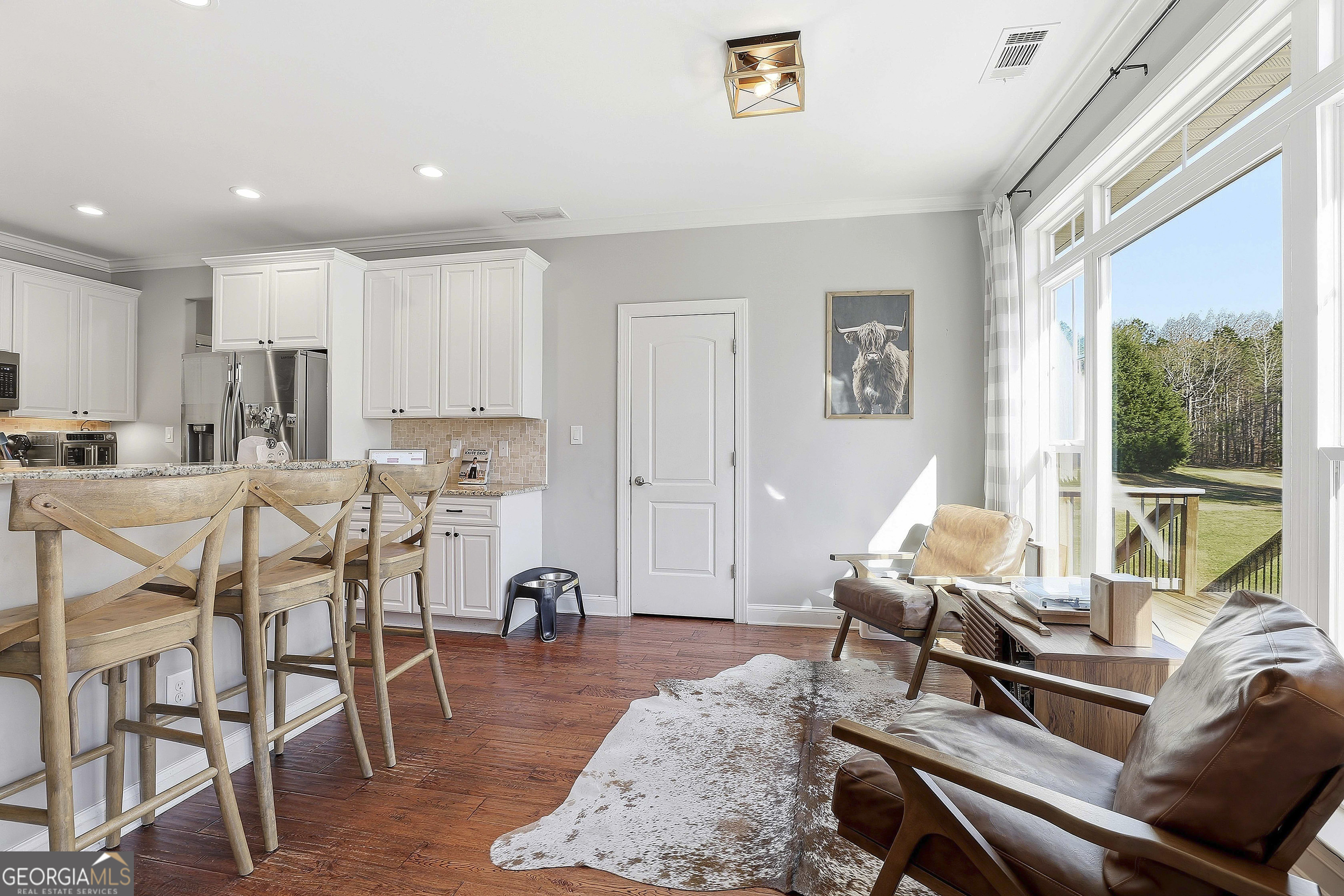 170 Emerson Ridge Trail Senoia, GA 30276 - Photo 21 of 24 a living room with furniture and a large window