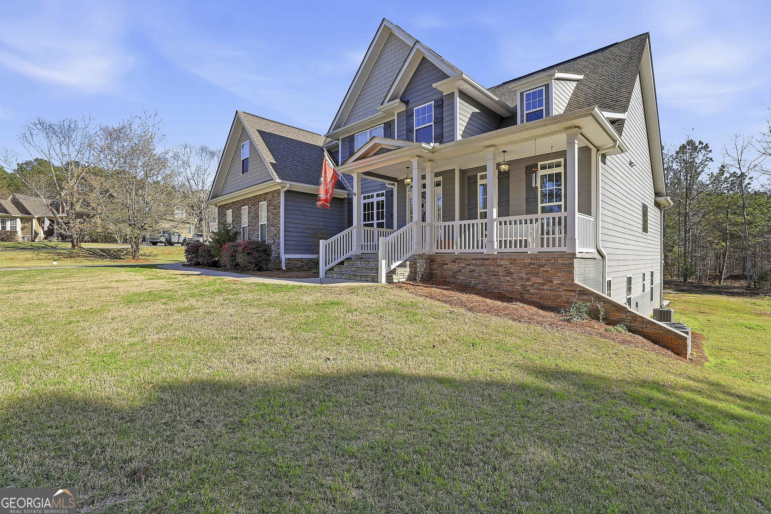 170 Emerson Ridge Trail Senoia, GA 30276 - Photo 4 of 24 a front view of a house with a yard