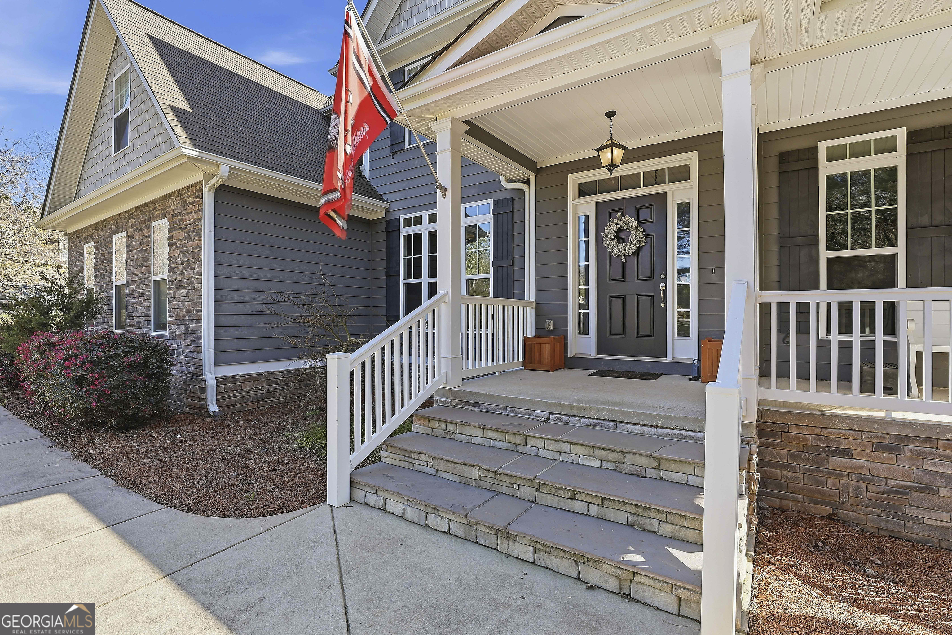 170 Emerson Ridge Trail Senoia, GA 30276 - Photo 6 of 24 a view of a house with a small yard and wooden floor and fence