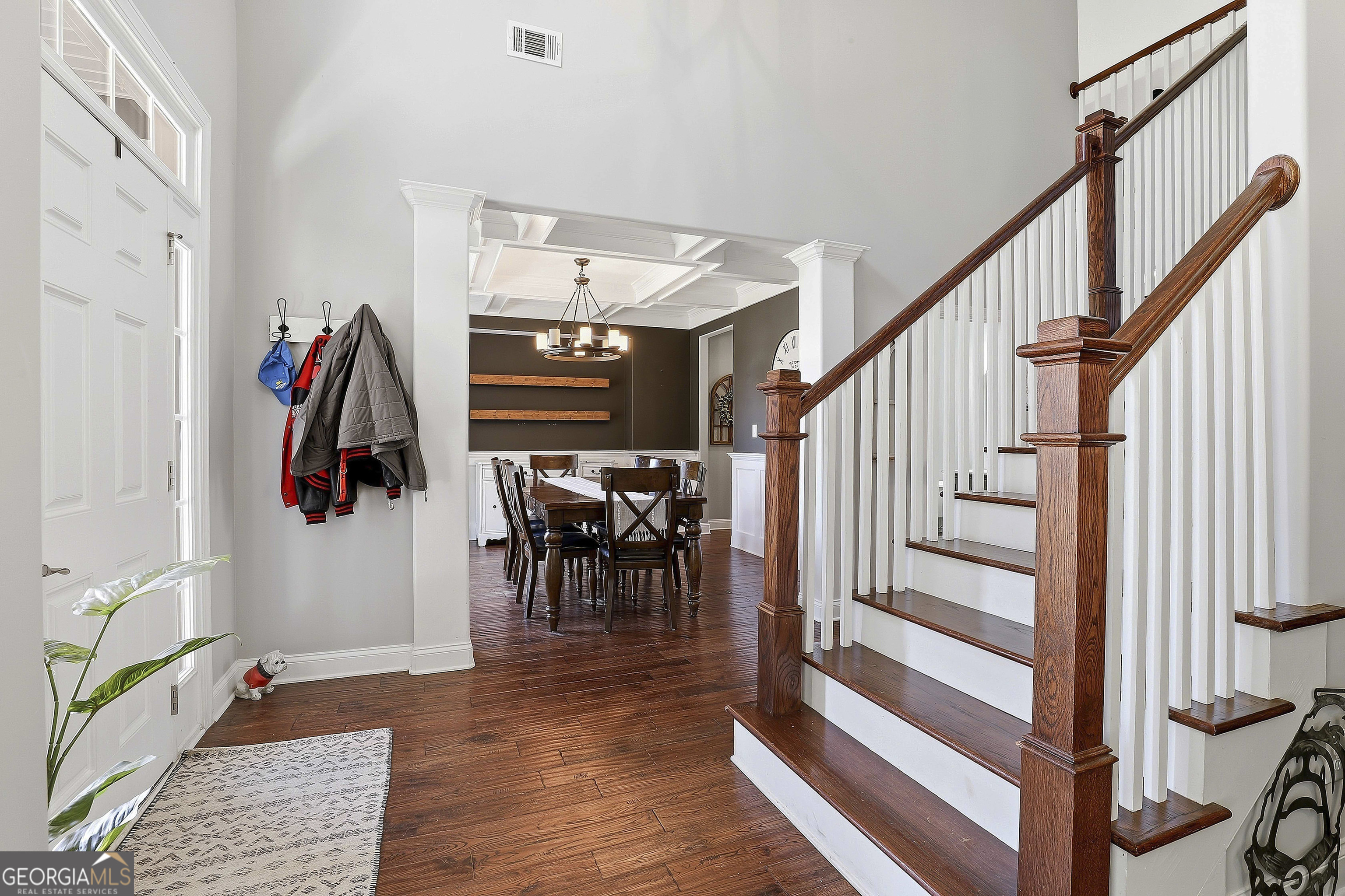 170 Emerson Ridge Trail Senoia, GA 30276 - Photo 8 of 24 a view of entryway and hall with wooden floor