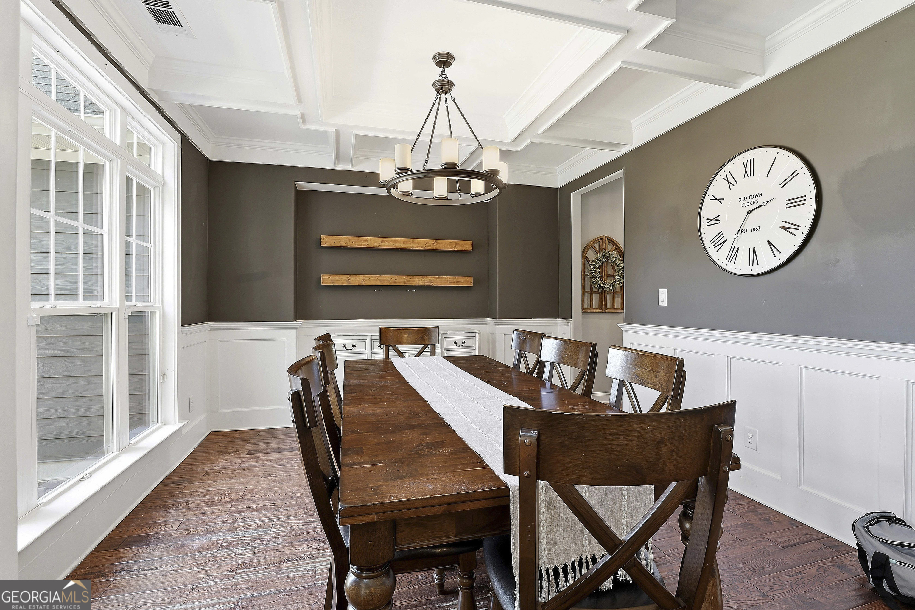 170 Emerson Ridge Trail Senoia, GA 30276 - Photo 9 of 24 a view of a dining room with furniture window and wooden floor