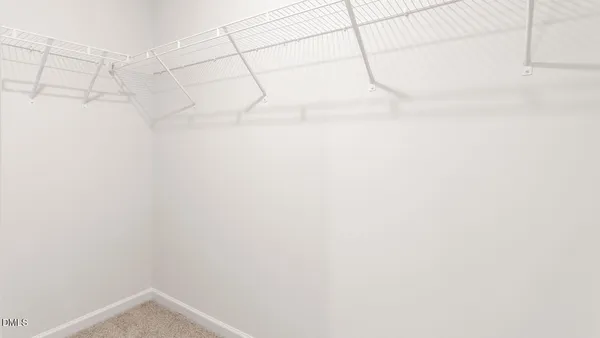 a bathroom with a shower and toilet