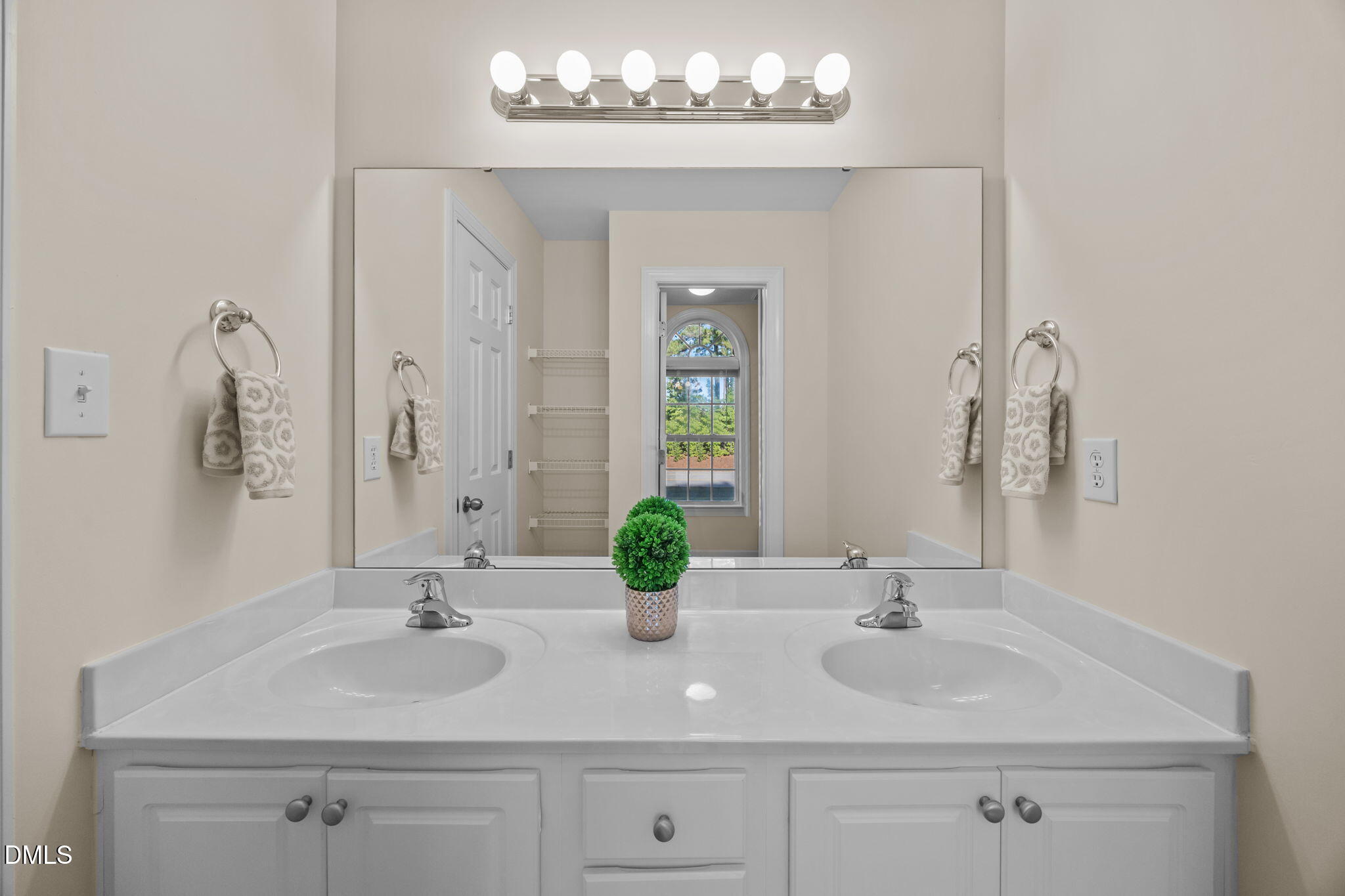 505 Vinson Road Clayton, NC 27527 - Photo 20 of 31 a bathroom with double sink and a mirror