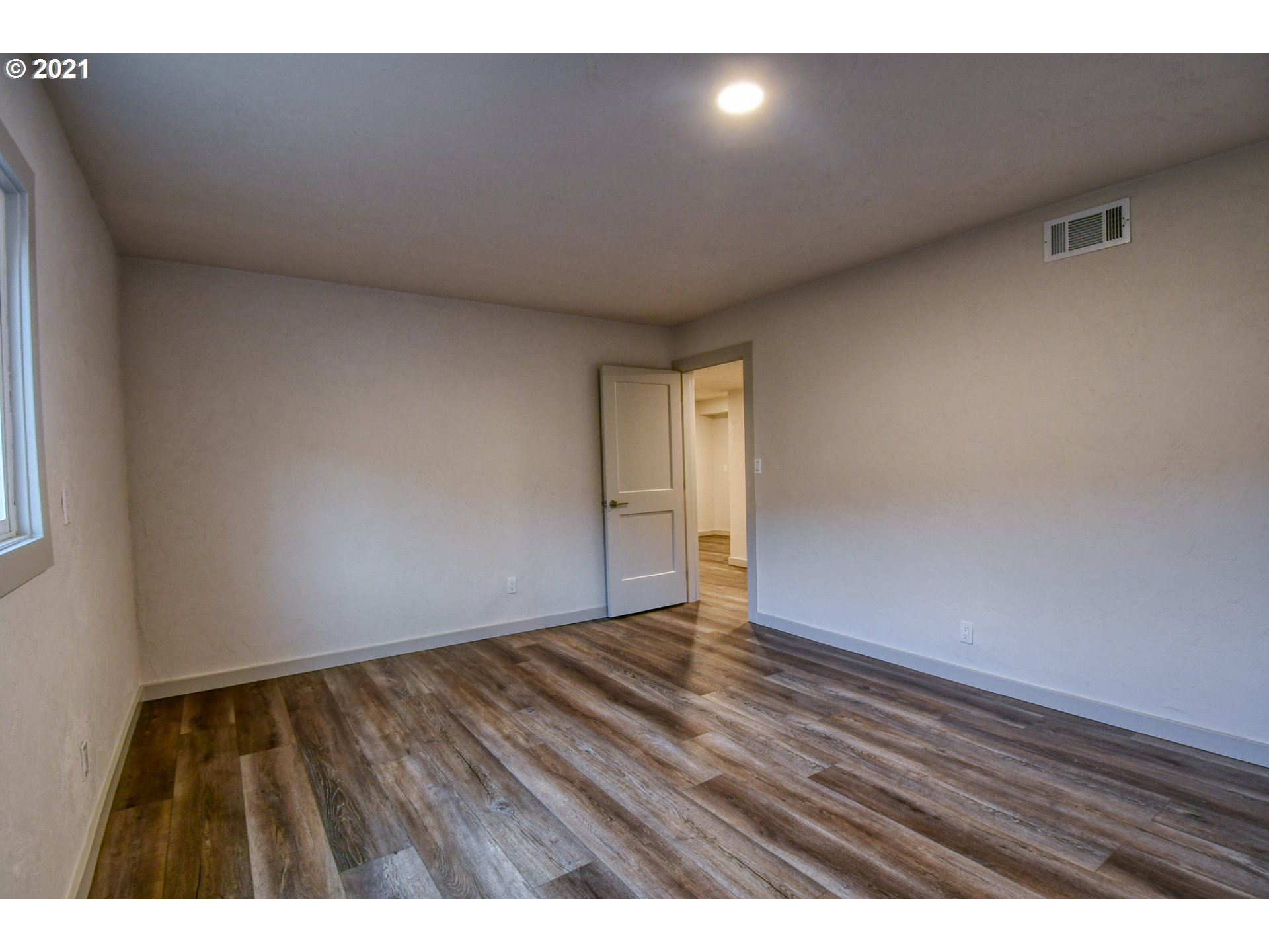 71711 Emigrant Road Pendleton, OR 97801 - Photo 23 of 32 a view of an empty room and wooden floor