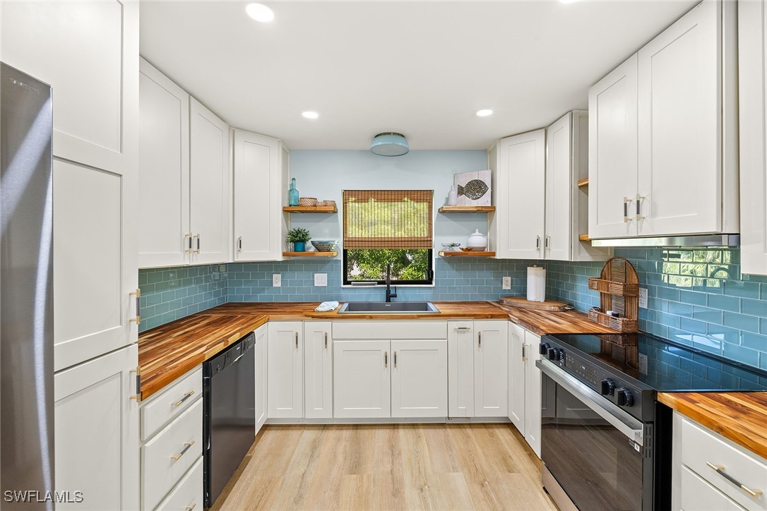 1448 Albatross Road Sanibel, FL 33957 - Photo 3 of 36