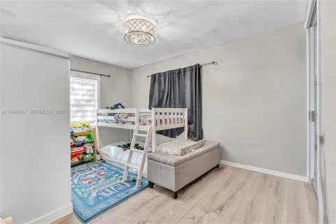 a view of living room with furniture and rug