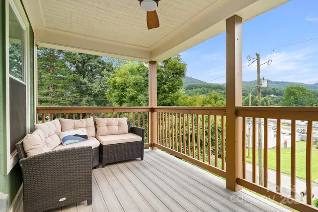 a view of staircase with a rug