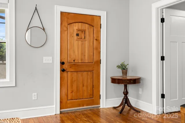 a view of a door and a window