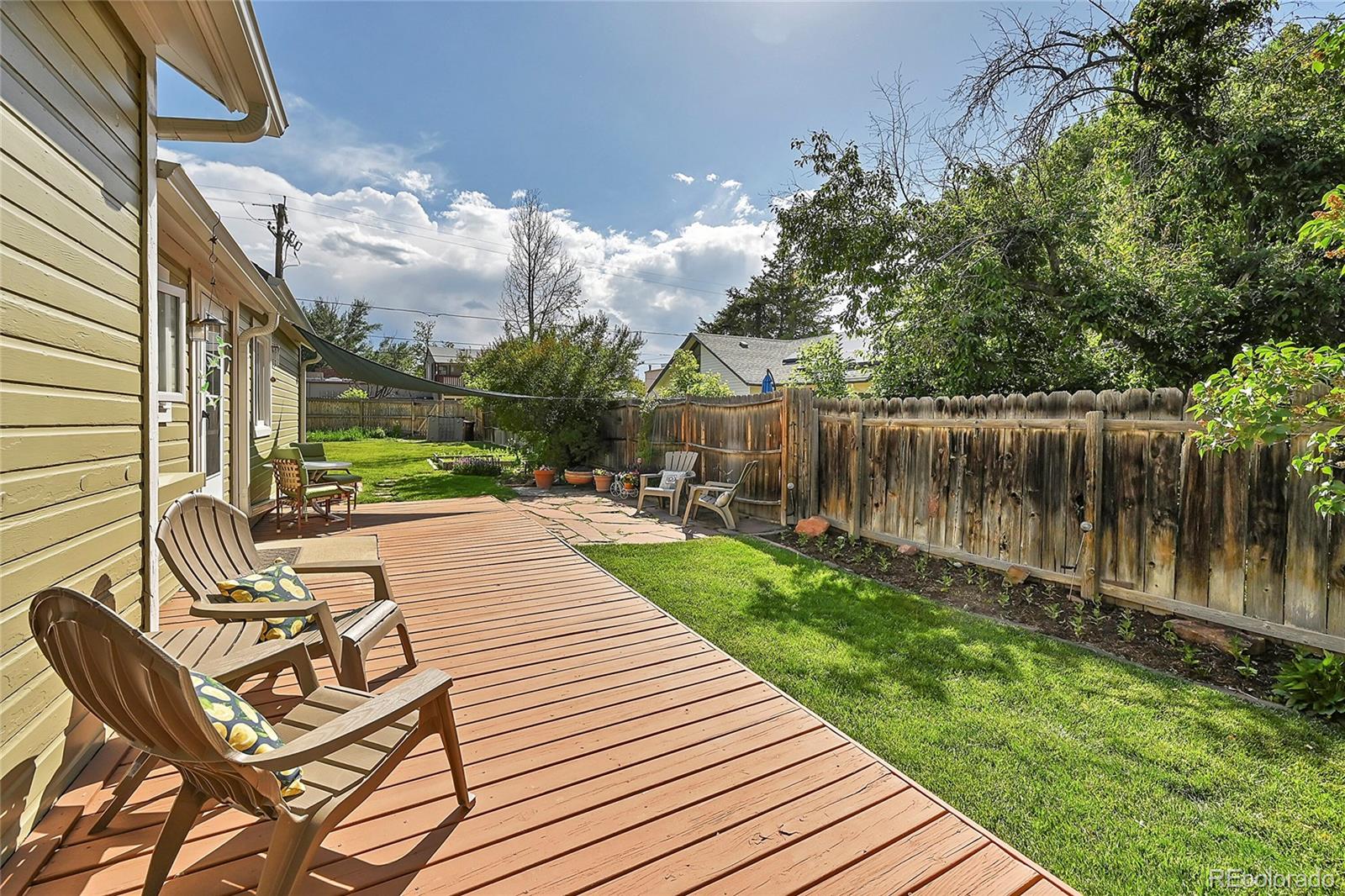141 3rd Avenue Niwot, CO 80544 - Photo 31 of 49 a view of swimming pool with garden and patio
