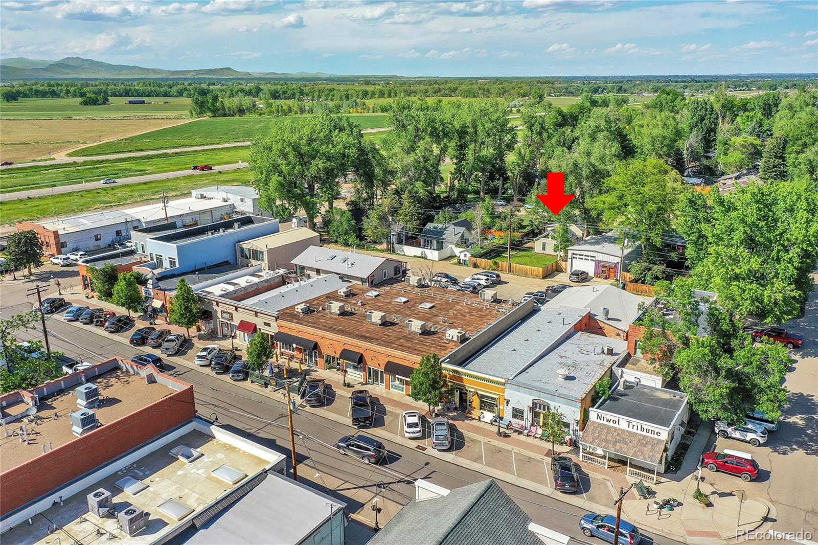 141 3rd Avenue Niwot, CO 80544 - Photo 43 of 49 a view of a chairs and table on the terrace