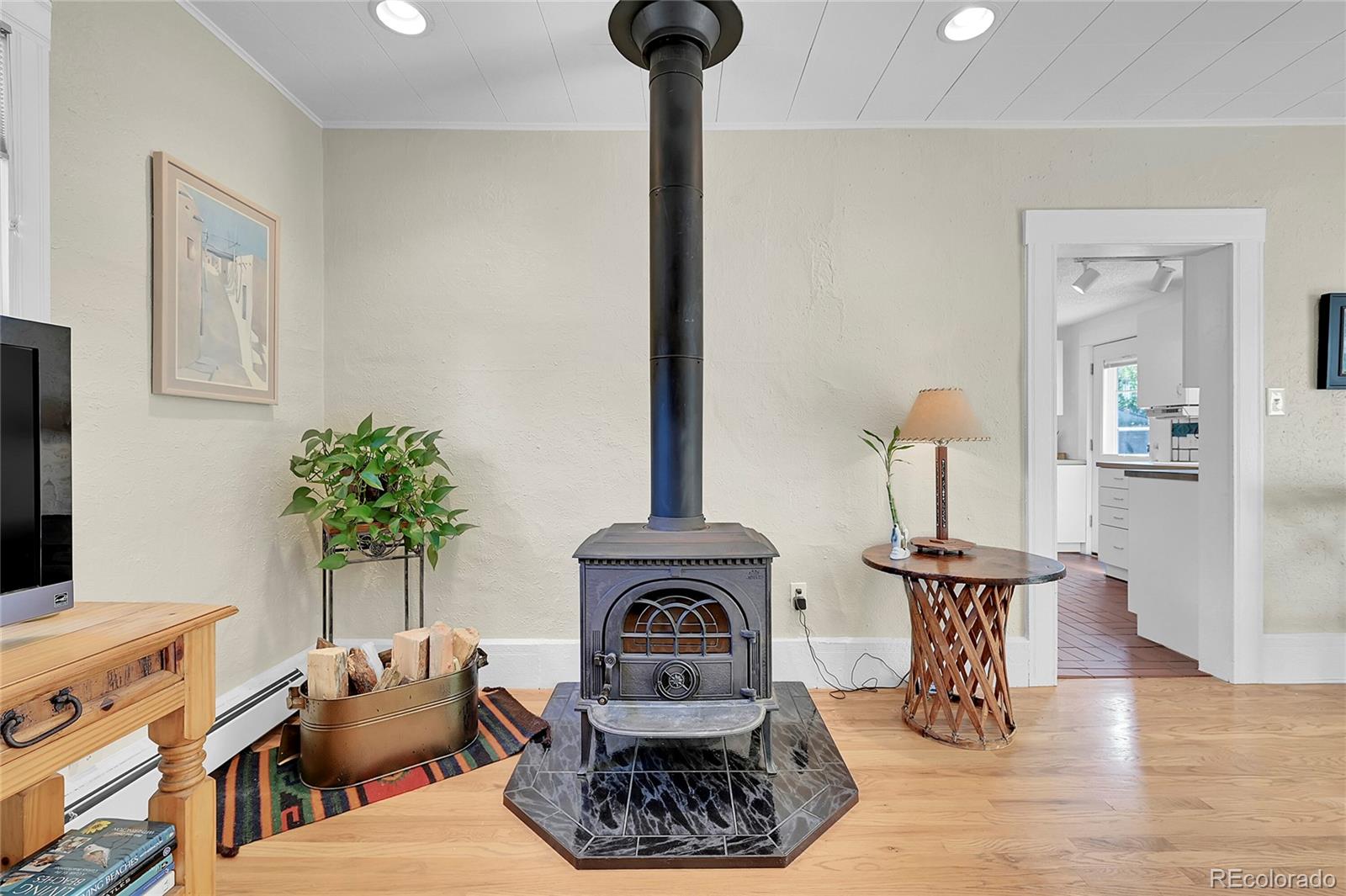 141 3rd Avenue Niwot, CO 80544 - Photo 6 of 49 a living room with furniture and a fireplace
