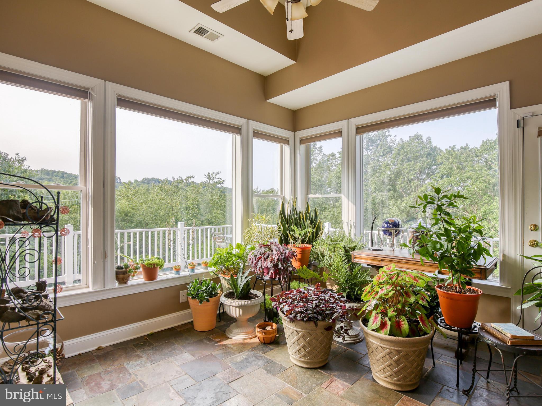 25 Jenkins Road Gerrardstown, WV 25420 - Photo 21 of 61 Solarium over looking acres of trees!