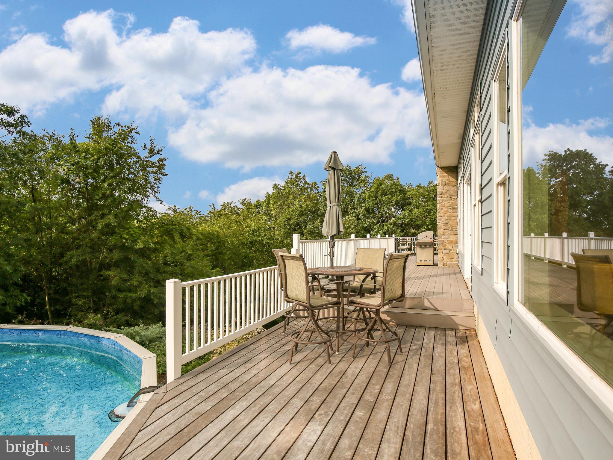 25 Jenkins Road Gerrardstown, WV 25420 - Photo 45 of 61 Rear deck by pool