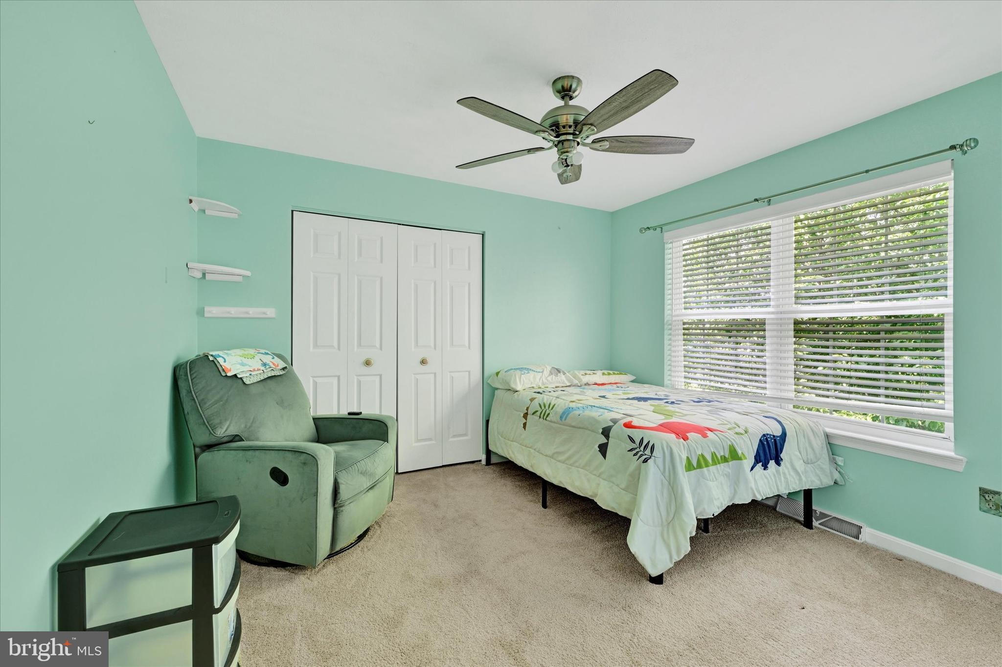 4195 Fallow Drive Hampstead, MD 21074 - Photo 22 of 40 a bedroom with a bed a desk and chair
