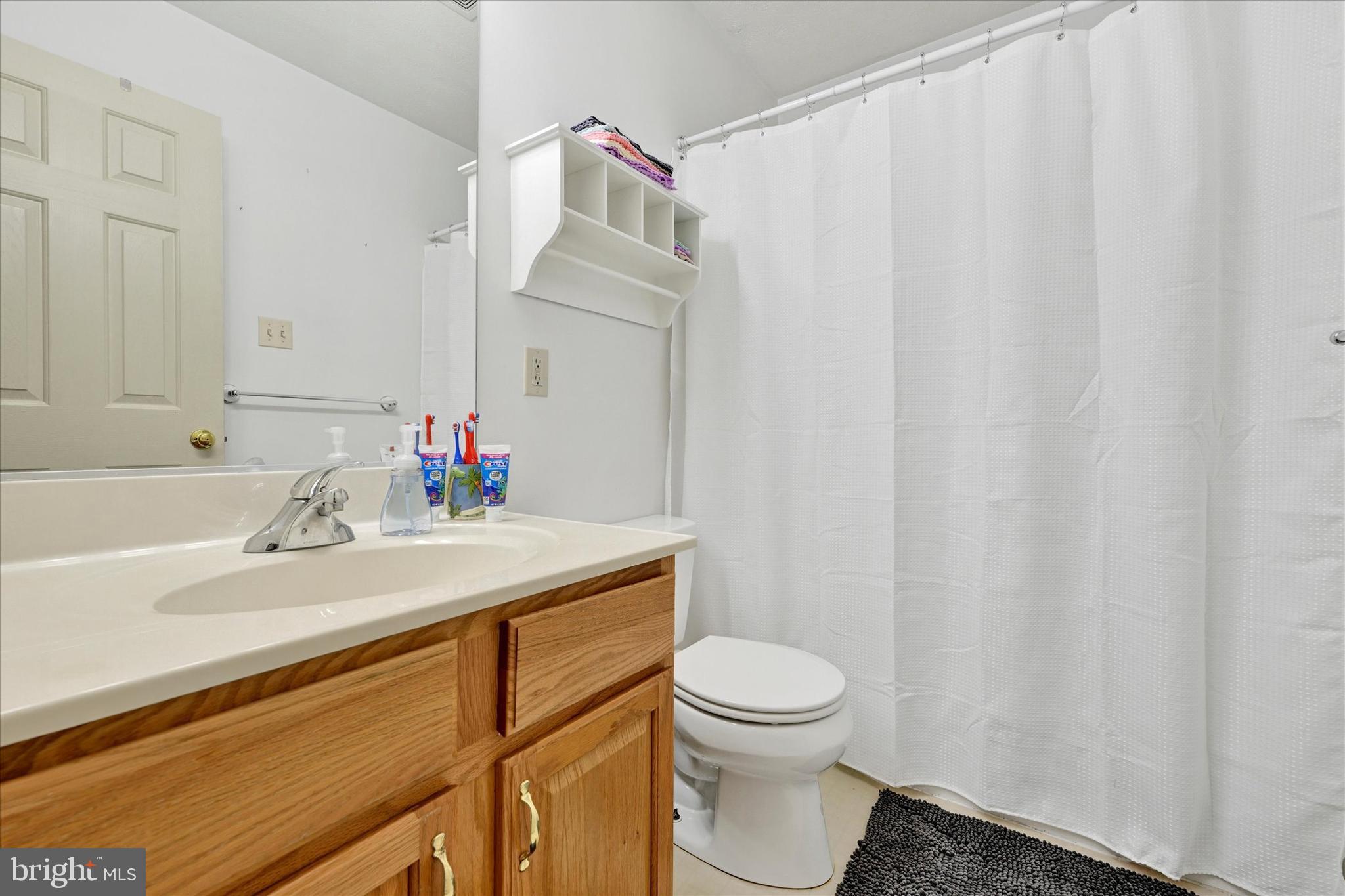 4195 Fallow Drive Hampstead, MD 21074 - Photo 24 of 40 a bathroom with a sink and a mirror