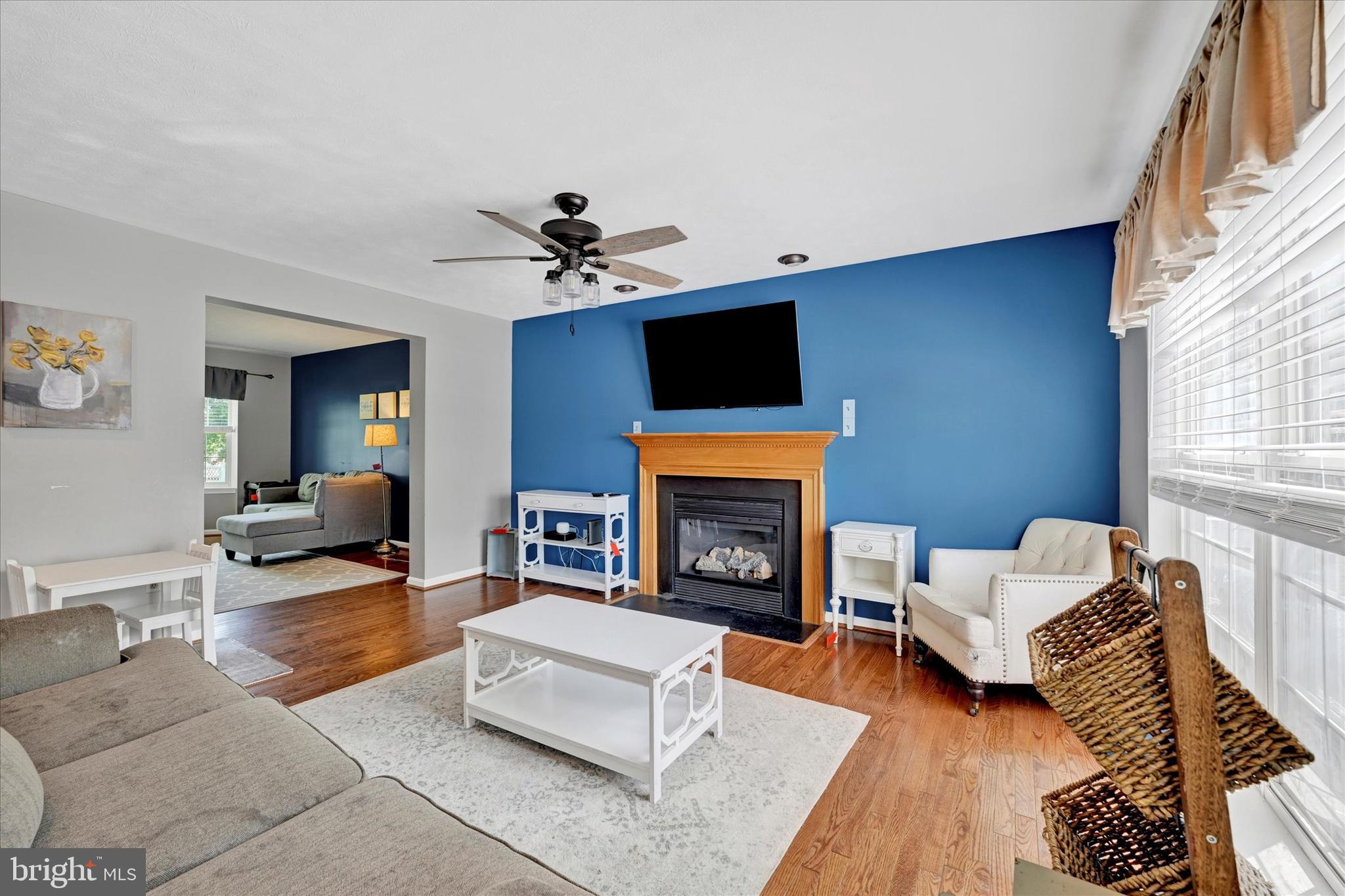 4195 Fallow Drive Hampstead, MD 21074 - Photo 10 of 40 a living room with furniture and a fireplace