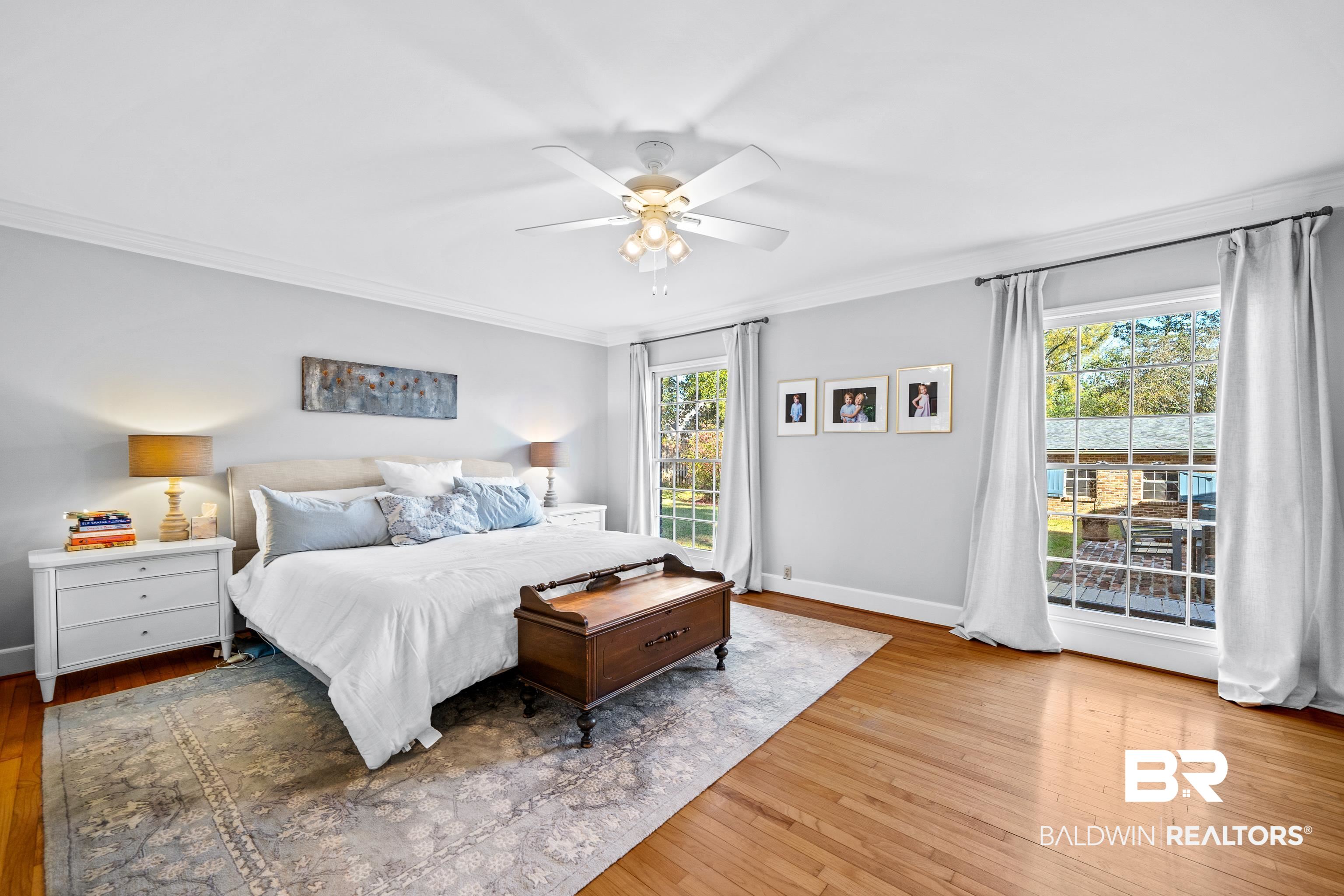 141 Myrtlewood Lane Mobile, AL 36608 - Photo 23 of 44 Bedroom with wood-type flooring, a ceiling fan, crown molding, and baseboards