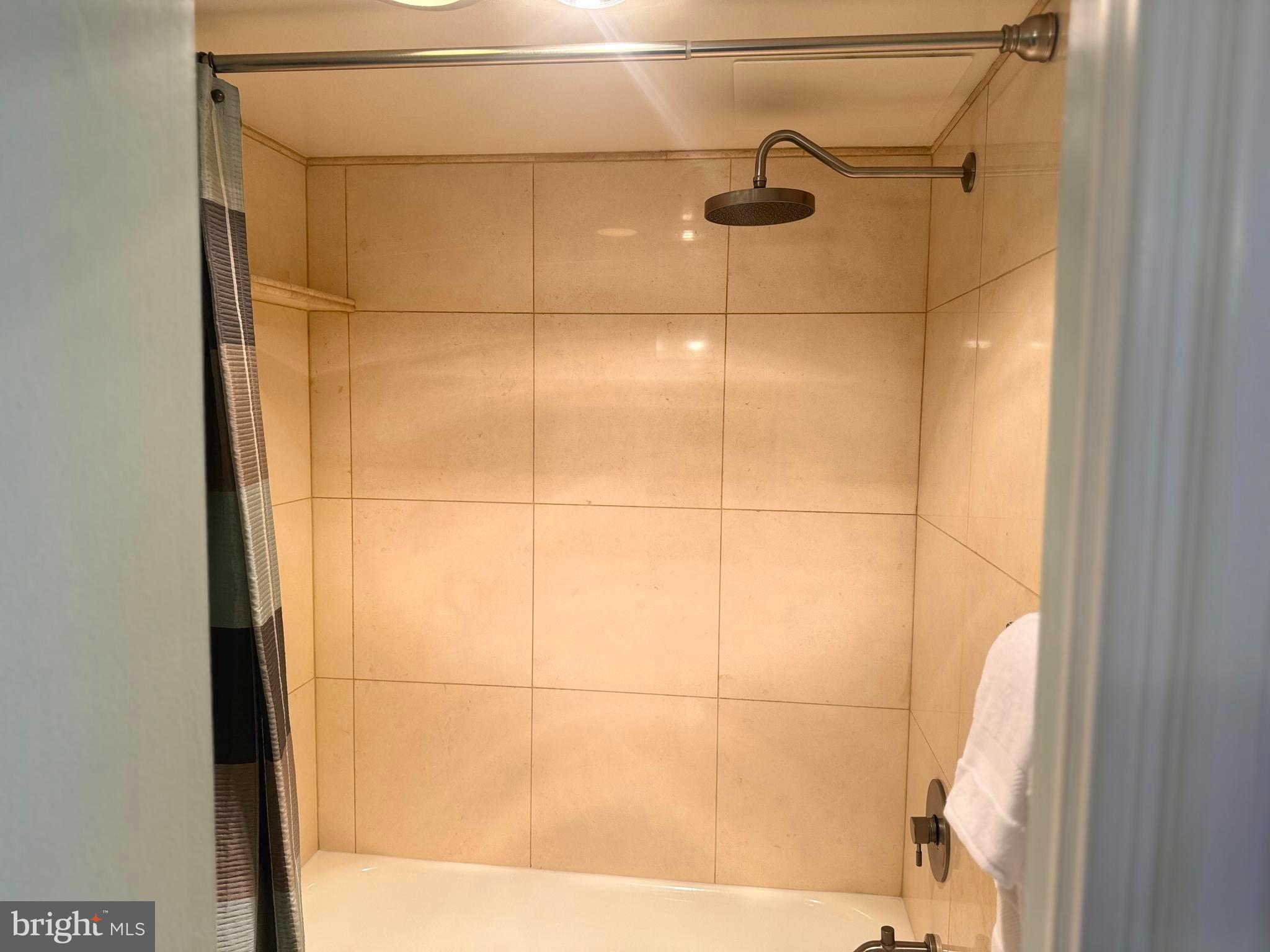 1245 13th Street Northwest, Unit 313 Washington, DC 20005 - Photo 21 of 43 a bathroom with a shower