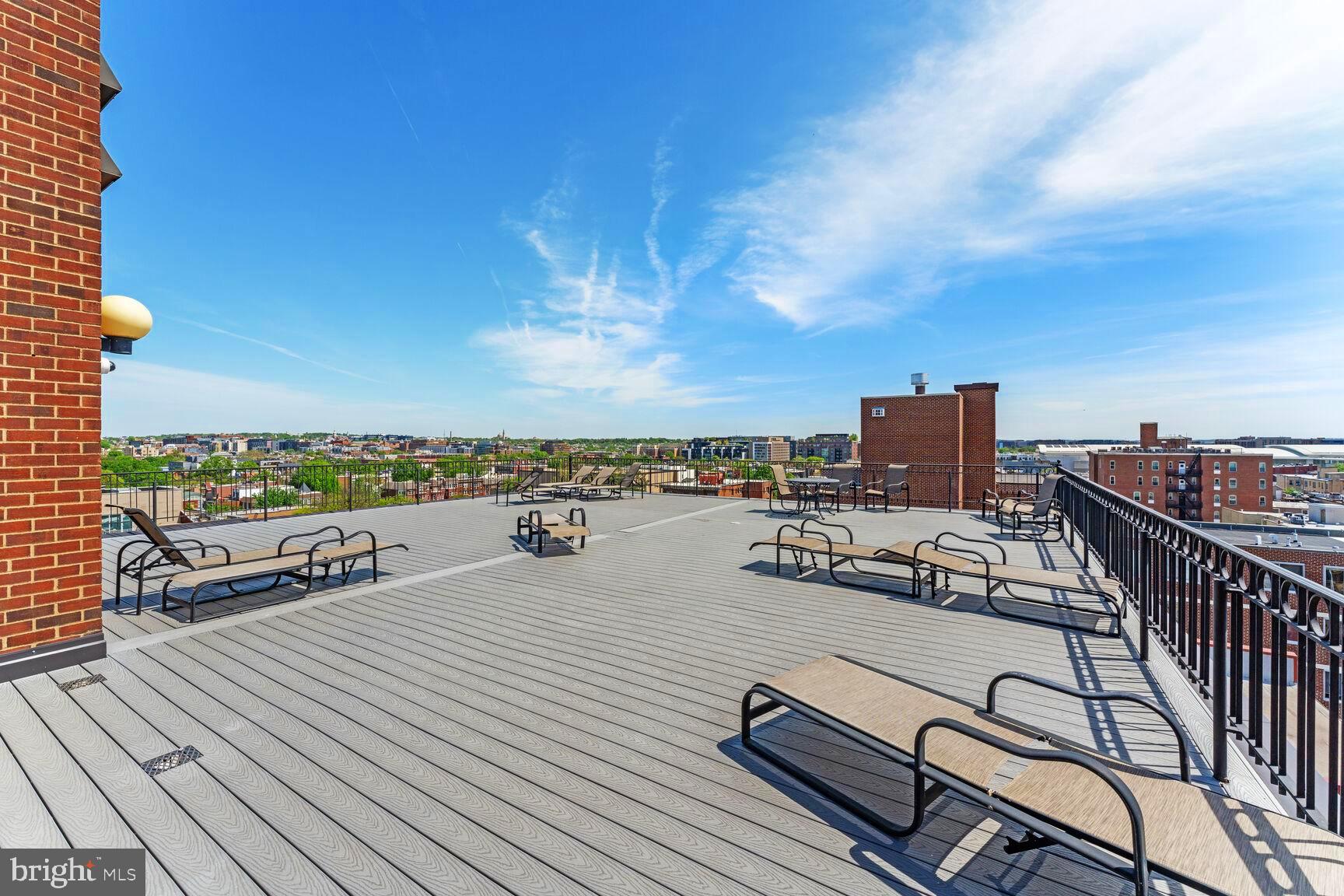 1245 13th Street Northwest, Unit 313 Washington, DC 20005 - Photo 25 of 43 a view of a terrace with seating space
