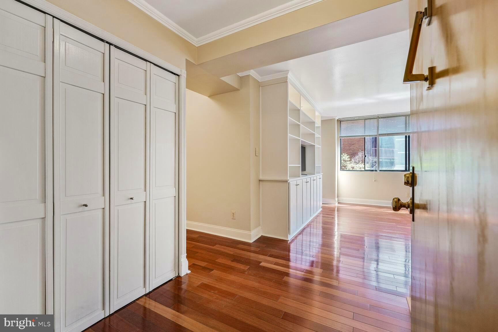 1245 13th Street Northwest, Unit 313 Washington, DC 20005 - Photo 6 of 33 a view of a room with wooden floor and a window