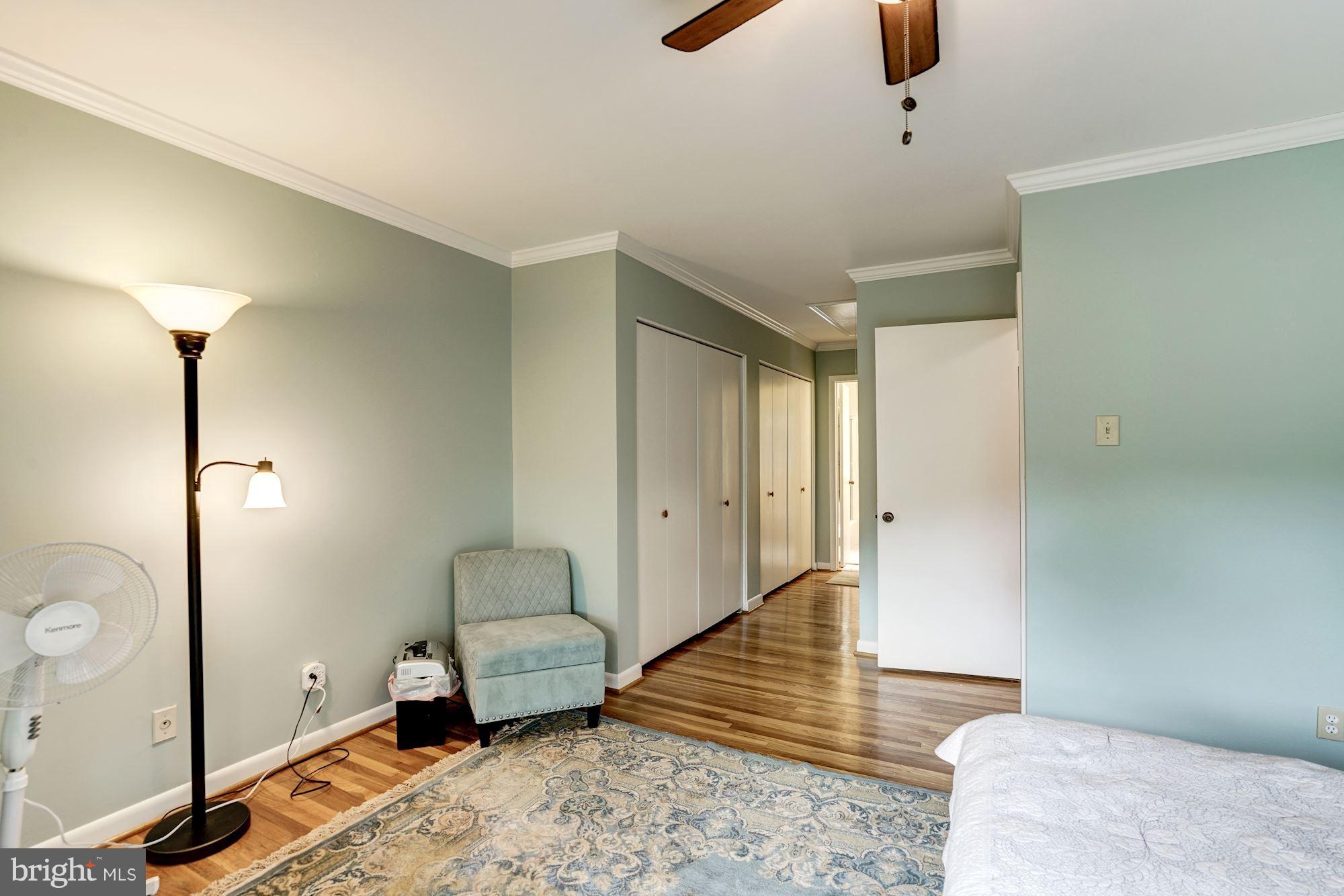 11089 Saffold Way Reston, VA 20190 - Photo 16 of 30 a bedroom with furniture and a rug