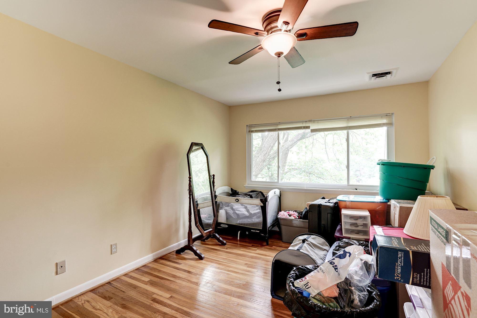 11089 Saffold Way Reston, VA 20190 - Photo 18 of 30 a view of a livingroom with furniture and a window