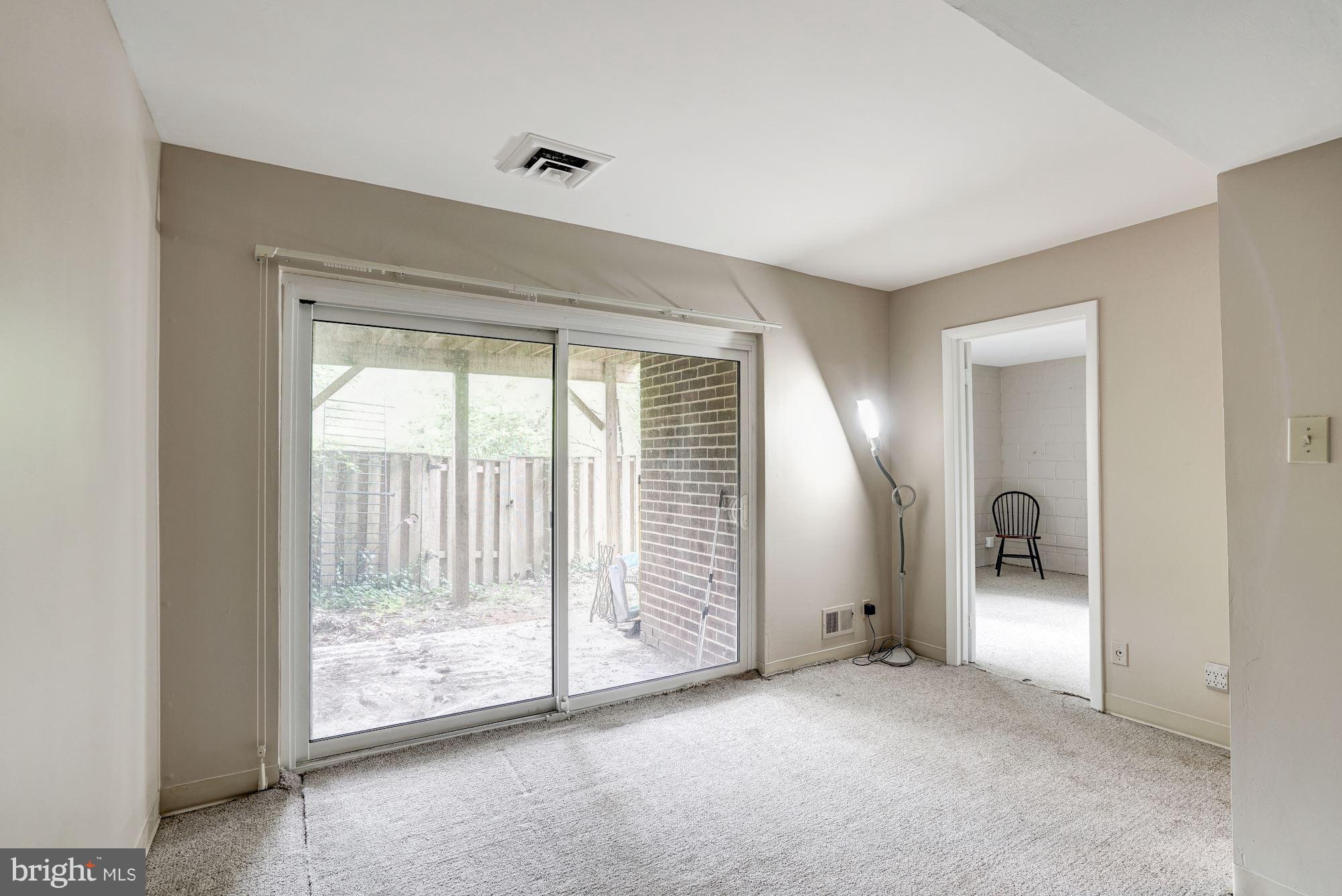11089 Saffold Way Reston, VA 20190 - Photo 24 of 30 a view of an empty room with a window