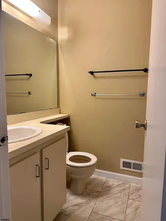 a bathroom with a sink and a toilet