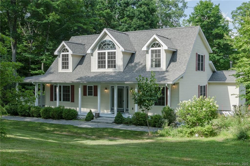 16 Burgess Road Morris, CT 06763 - Photo 1 of 1 a front view of a house with a yard
