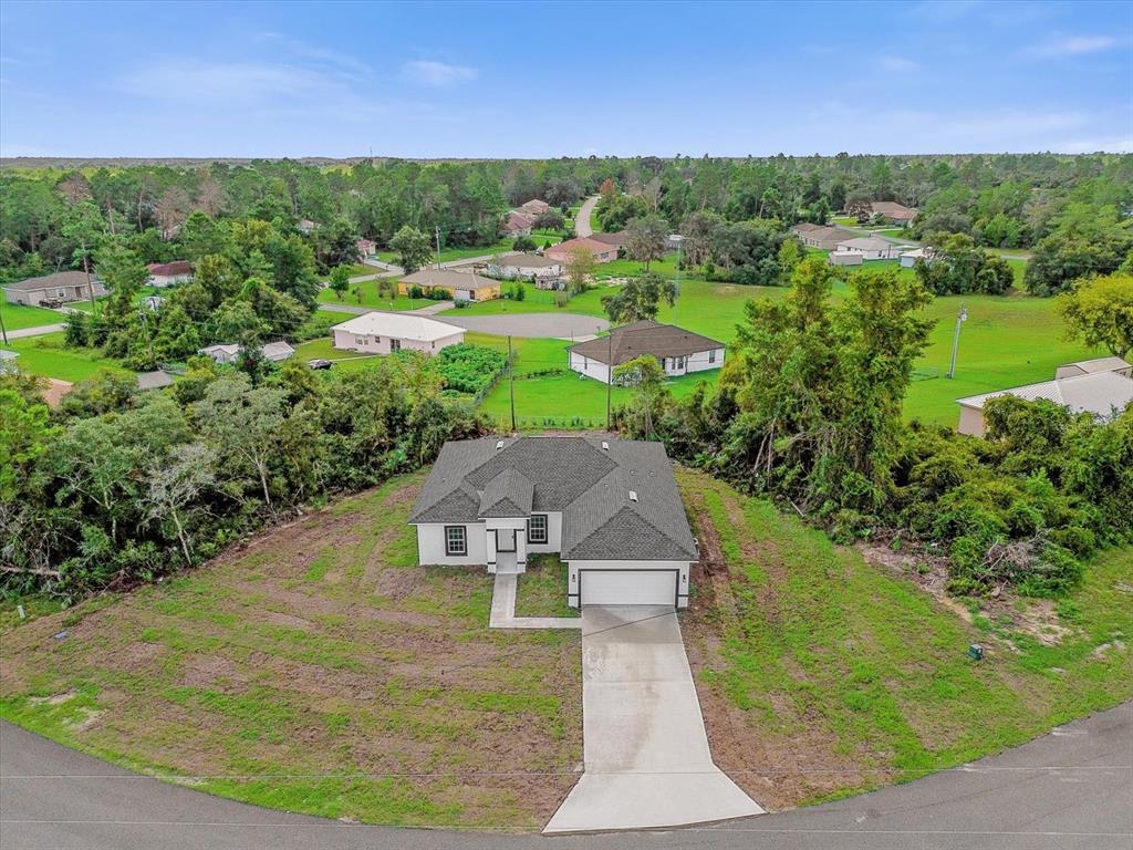2396 Southwest 147th Lane Road Ocala, FL 34473 - Photo 28 of 32 an aerial view of a house