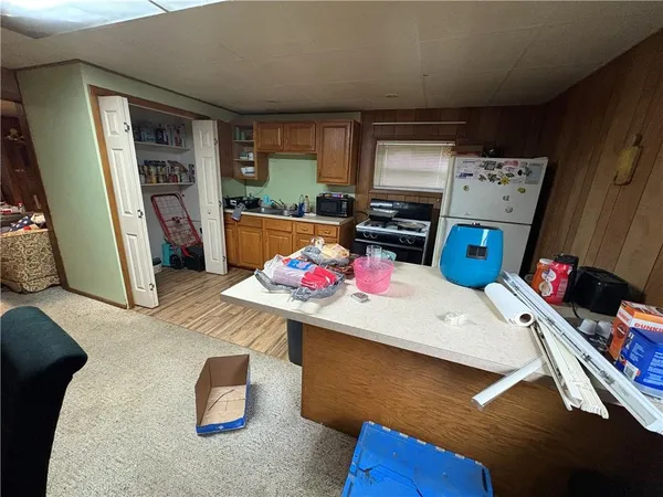 a room with furniture and a flat screen tv