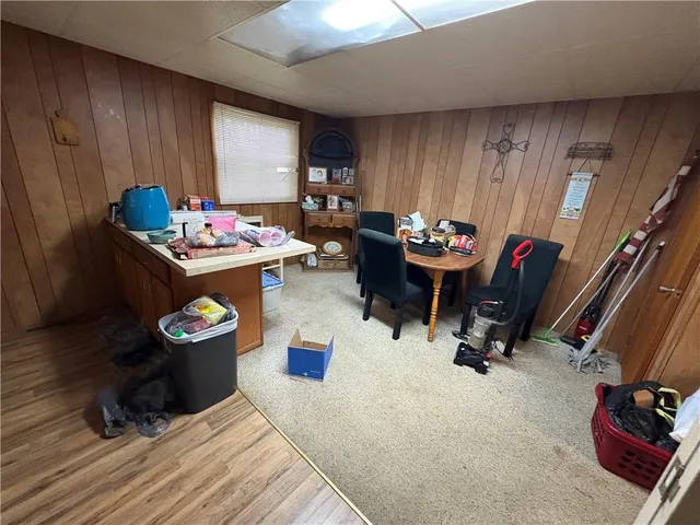 a room with furniture and a wooden floor