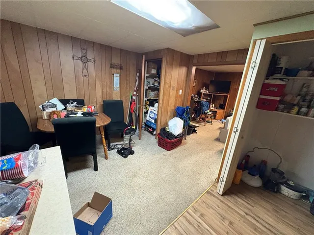 a room with furniture and wooden floor