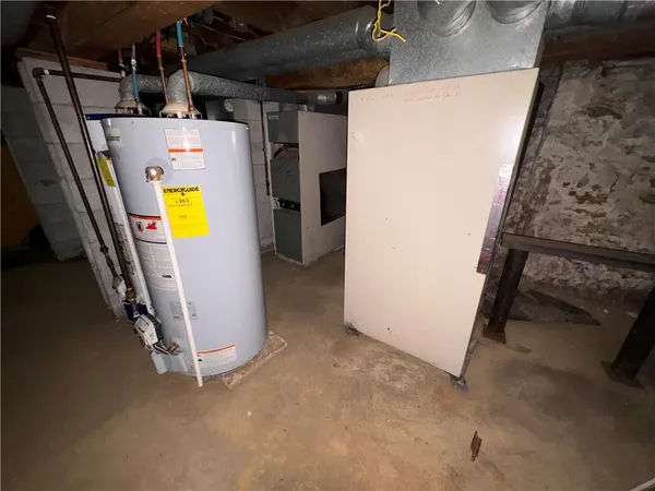 a view of a storage & utility room with washer and dryer