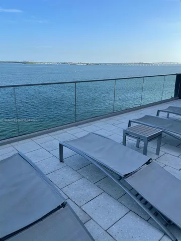 a view of outdoor space with seating area