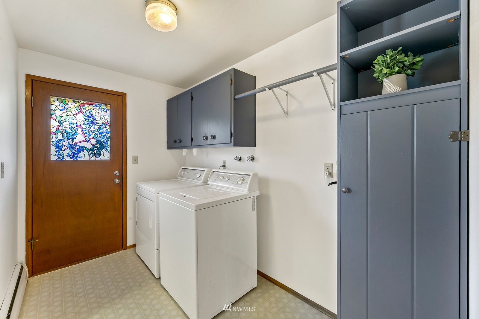309 Powell Avenue Southwest Renton, WA 98057 - Photo 18 of 29 a utility room with dryer and washer