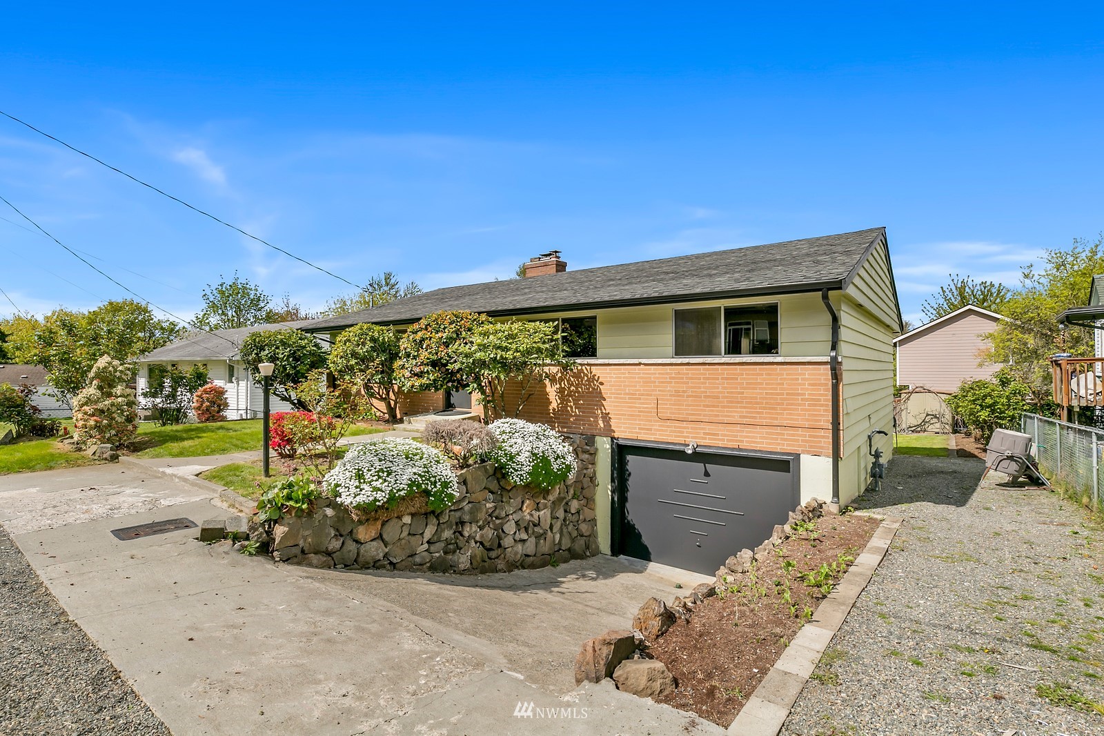 309 Powell Avenue Southwest Renton, WA 98057 - Photo 29 of 29 a view of a house with a outdoor space