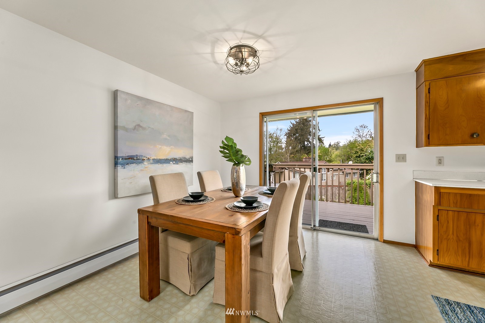 309 Powell Avenue Southwest Renton, WA 98057 - Photo 9 of 29 a dining room with furniture and window