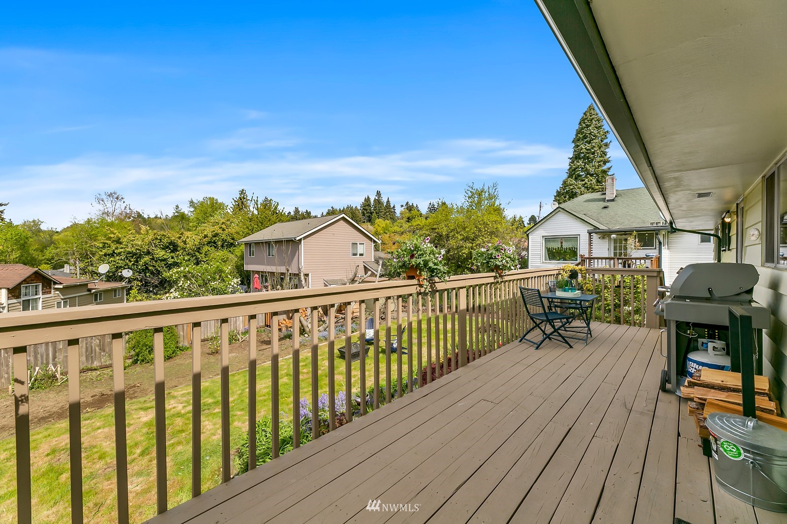 309 Powell Avenue Southwest Renton, WA 98057 - Photo 10 of 29 a view of a balcony with wooden floor and outdoor seating