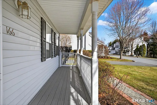 a view of a swimming pool with seating area