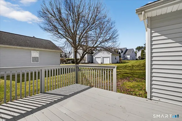 a view of a wooden roof deck