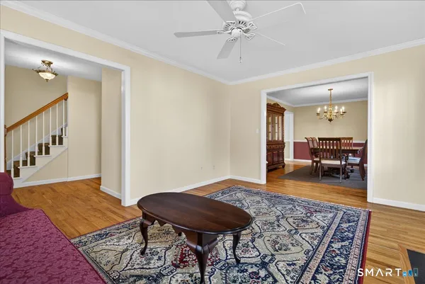 a living room with a rug