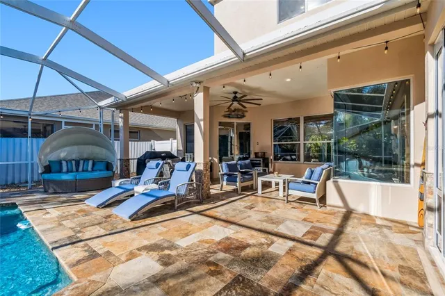 a kitchen with stainless steel appliances granite countertop a sink and a stove