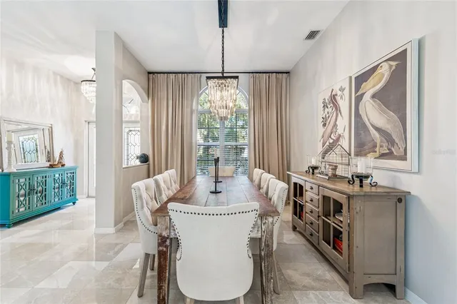 an aerial view of a house with swimming pool